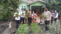 KAPOLSEK PERDAGANGAN TINJAU KAMPUNG TANGGUH DI PEMATANG KERASAAN.