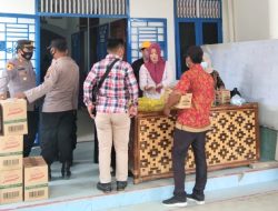 Kabag Ops Polres Batu Bara Tinjau Vaksinasi Sekaligus Pelaksanaan Pasar Murah di Desa Kuala Tanjung.
