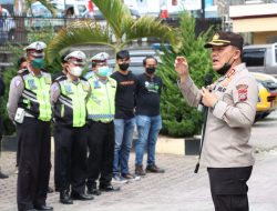 KAPOLRES SIMALUNGUN PIMPIN APEL KONSOLIDASI PENGAMANAN KEJUARAAN NASIONAL DANAU TOBA RALLY PUT 1 TAHUN 2022