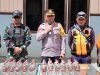 Satgas Yonif 330 Bekerjasama Dengan Polres Intan Jaya Musnahkan Puluhan Botol Miras Ilegal